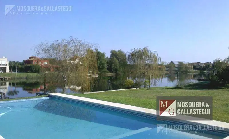 Casa a laguna , 3 dormitorios y dependencias.Venta o alquiler anual o temporal 4