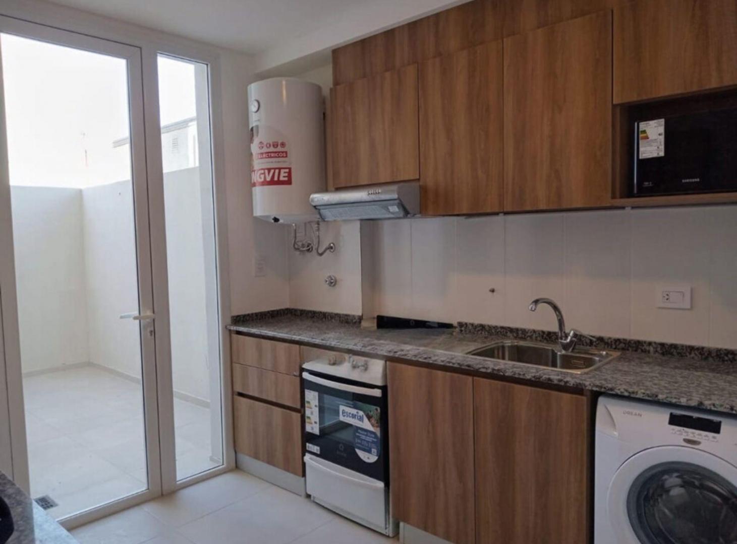 Foto de Departamento Dúplex de 2 dorm. + Cochera y baulera, imagen 2