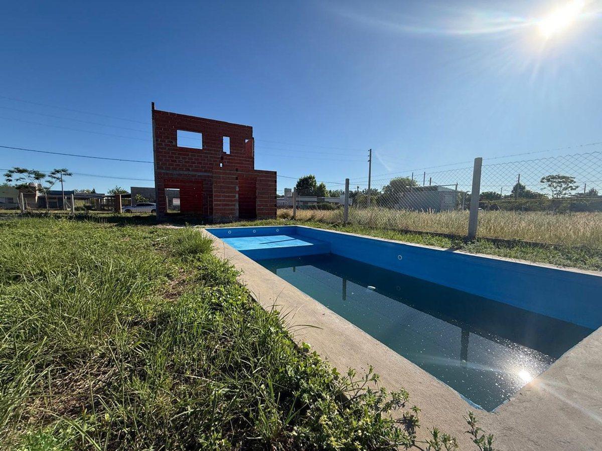 Foto de JARDINES DE LA COSTA TERRENO CON CONSTRUC. Y PILE, imagen 3