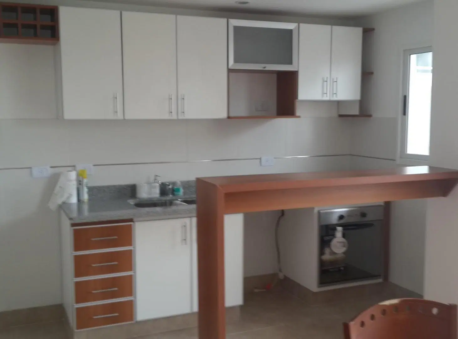 Impecable 2 ambientes con balcon y cochera 2