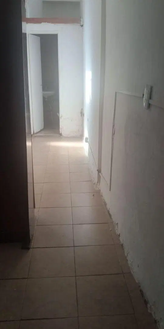 un ambiente ph sobre calle cuenca entrada por pasillo 3