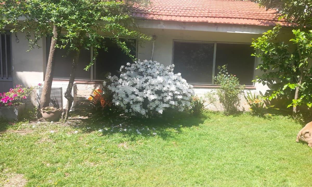 Casa en Tres Plantas con Jardín y Quincho 2