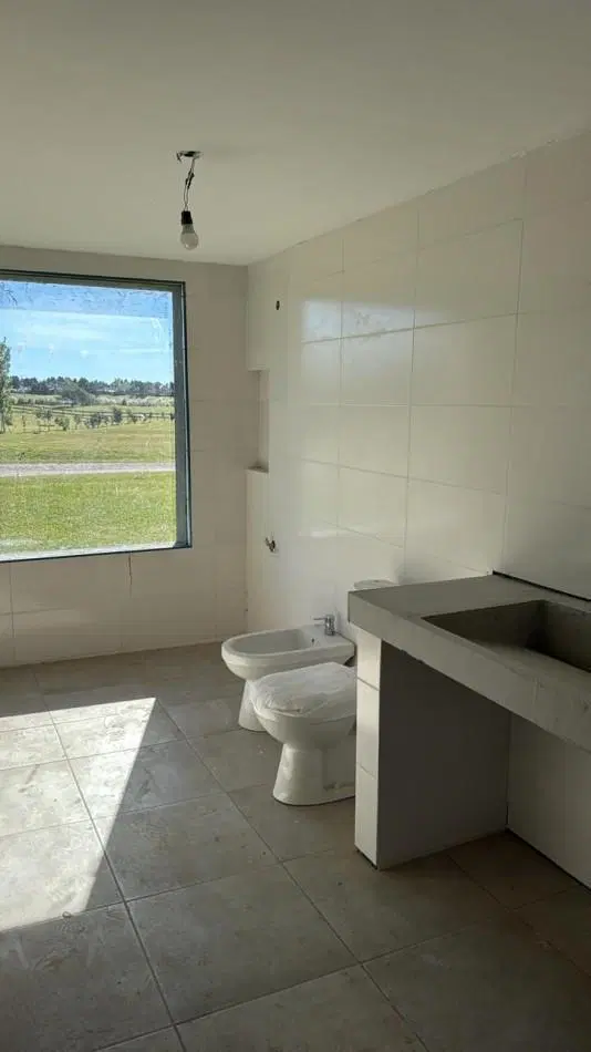 HERMOSA CASA A ESTRENAR SOBRE LOTE DE 2000 M2 EN EL ESPINILLO GOLF CLUB DE CAMPO 5