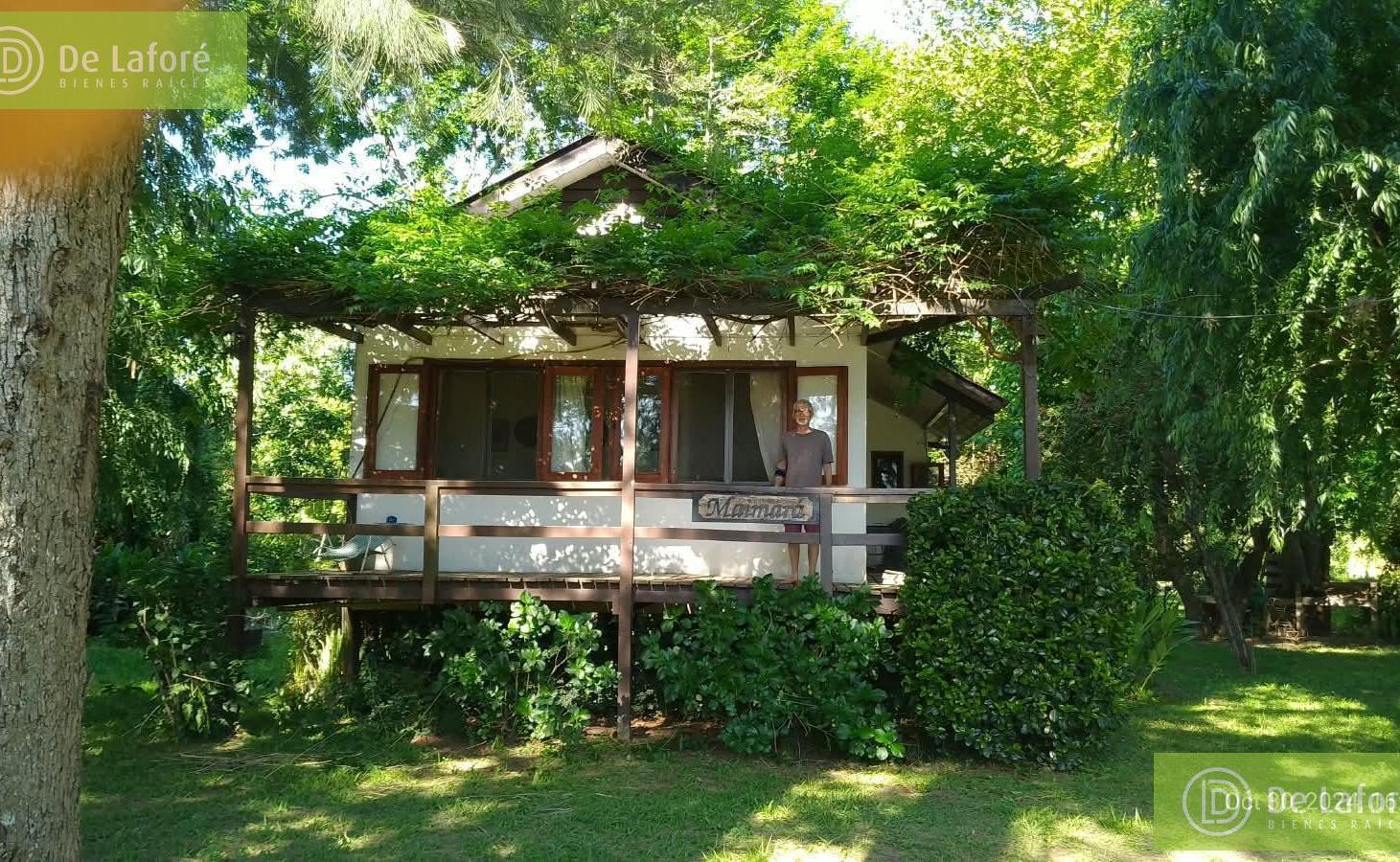 Foto de VENTA - Casa isleña con 2 lotes, 34m sobre R. Capitán, muelle y rampa, imagen 1