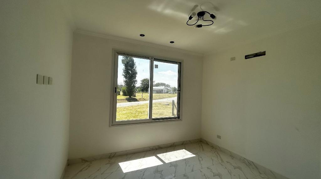 Venta casa a estrenar en Medal Country Club Pilar - Gran Lote interno