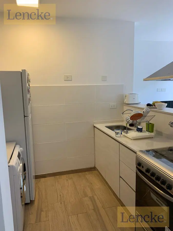 Excelente departamento en venta con renta, Punta Chica, 2 dormitorios contrafte a jardín, impecable 2