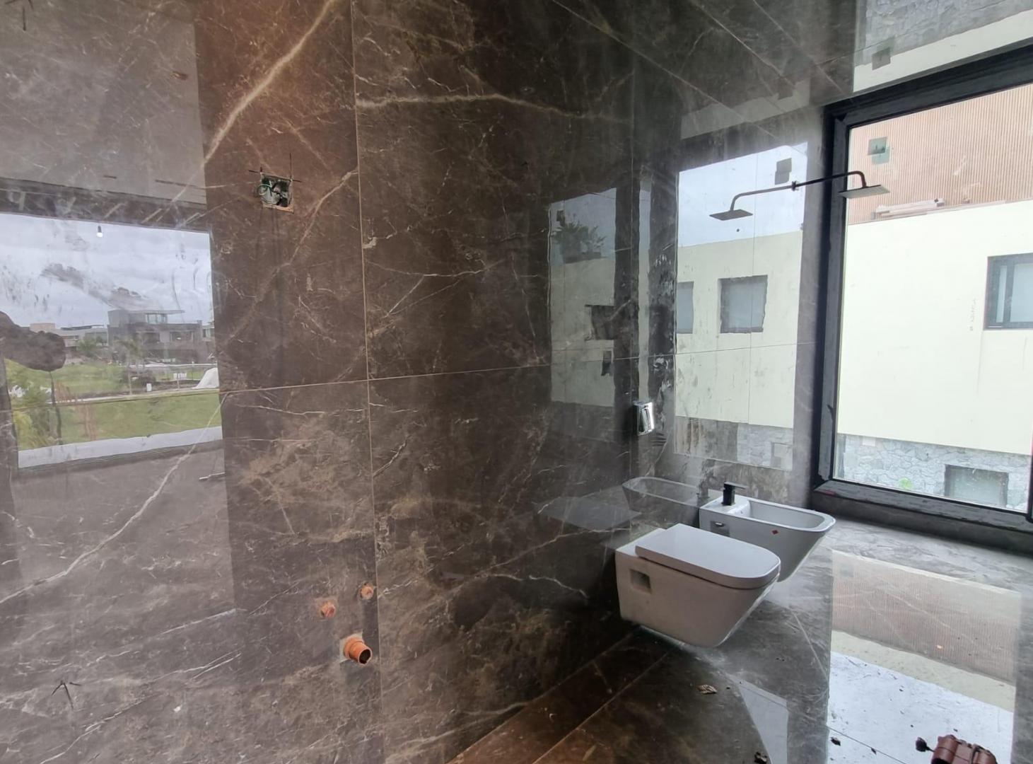Foto de Casa de 6 ambientes con 4 cocheras en venta en el Yacht, Nordelta, imagen 3