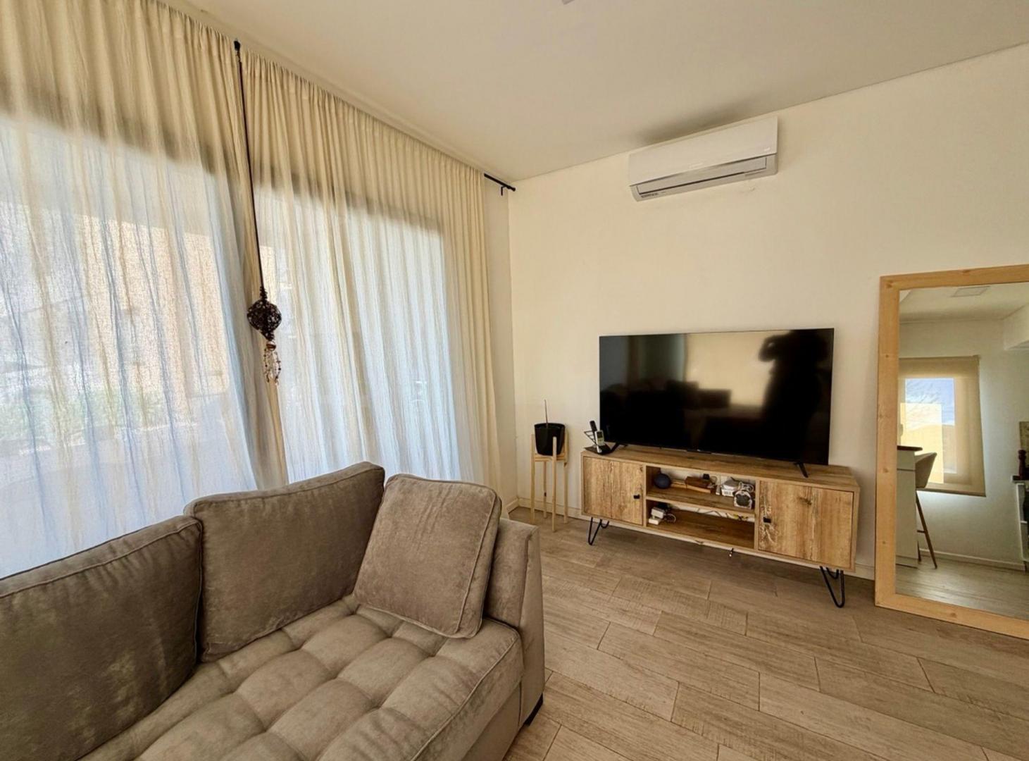 Foto de VENTA DEPTO 2 AMB PB JARDIN COCHERA PILAR CAÑADA, imagen 2