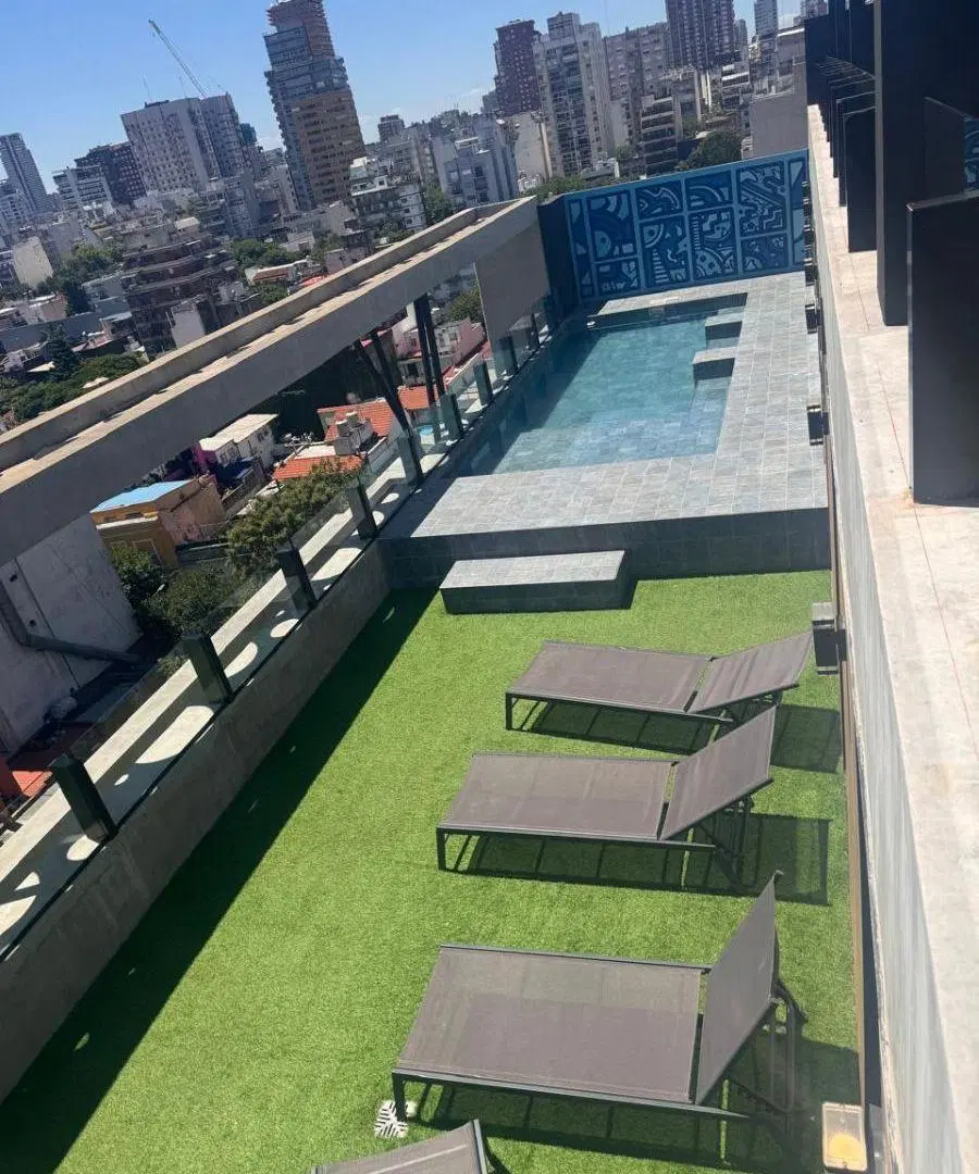Excelente departamento de 3 ambientes con cochera, con amplio solarium 2