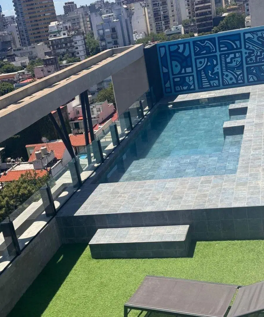 Excelente departamento de 3 ambientes con cochera, con amplio solarium 1