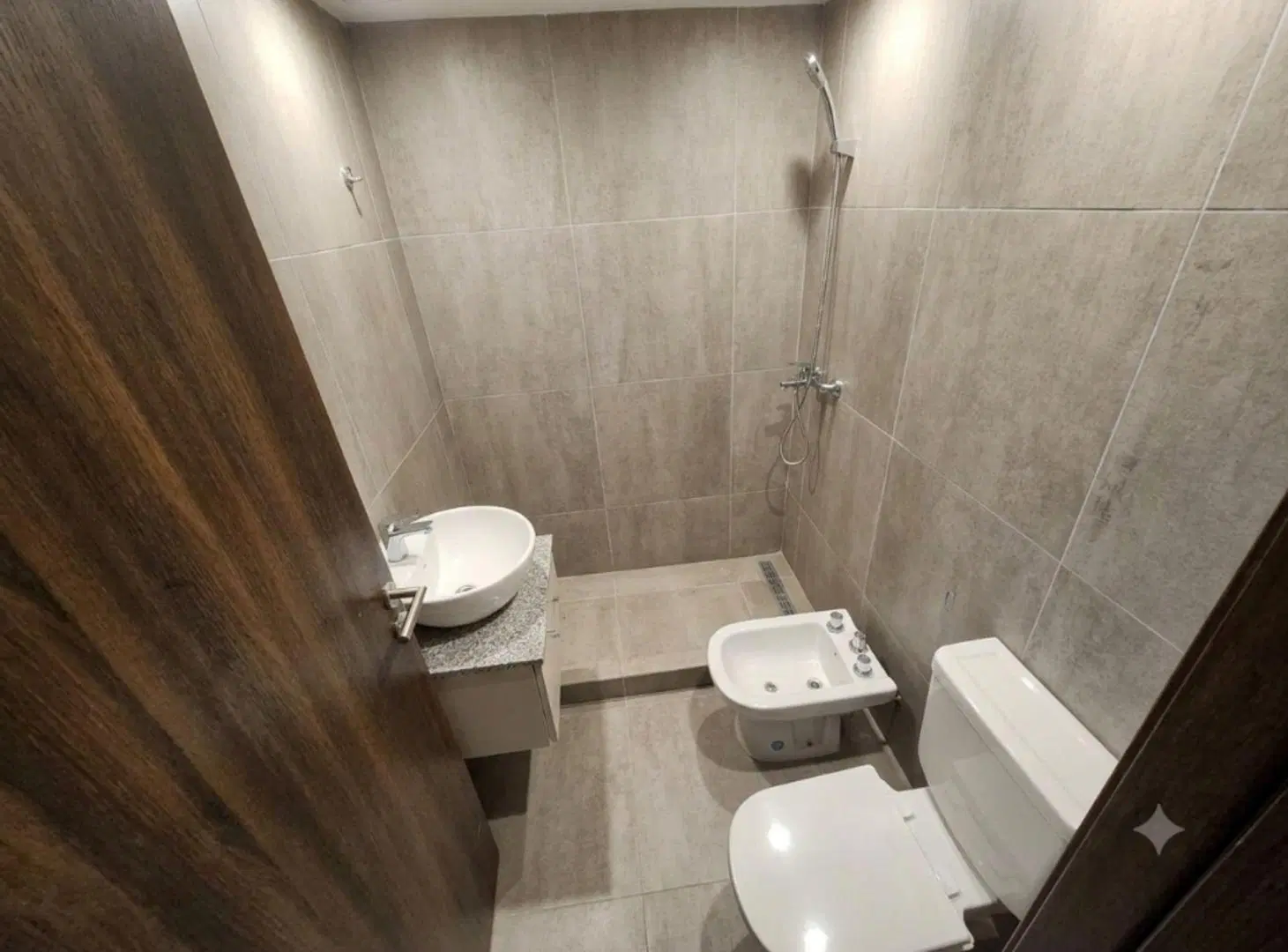 Departamento a estrenar de 2 ambientes con cochera 8