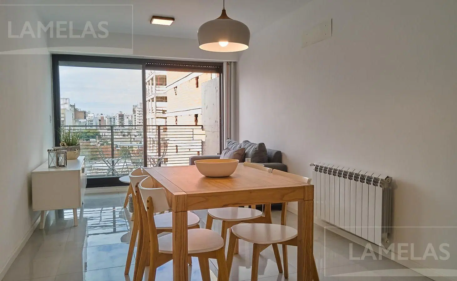 Venta departamento 1 dormitorio con doble balcón Sarmiento 1500 Rosario 2