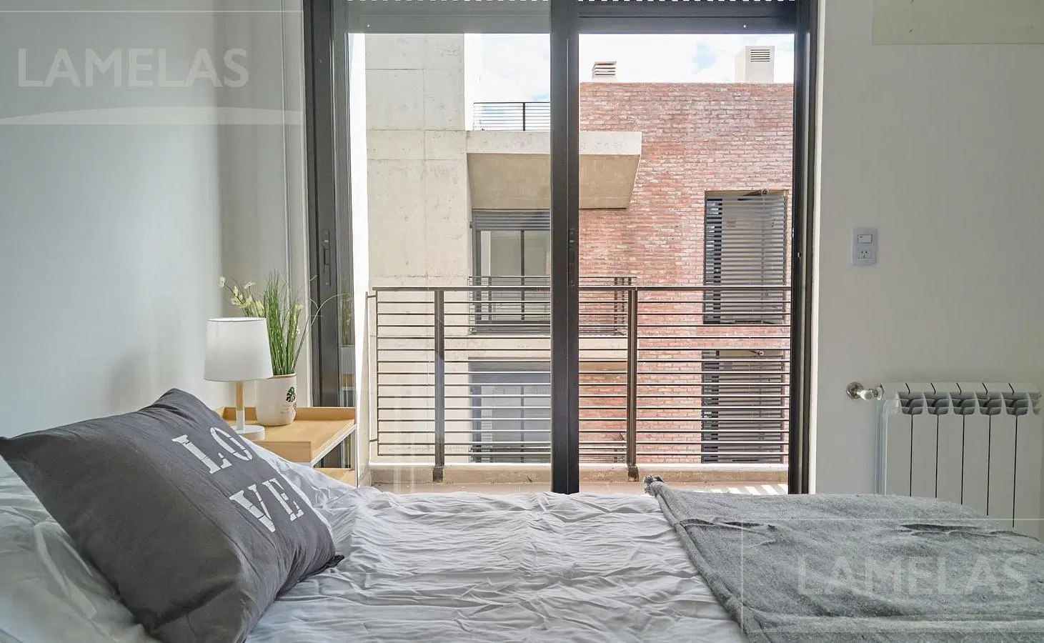 Venta departamento 1 dormitorio con doble balcón Sarmiento 1500 Rosario 5