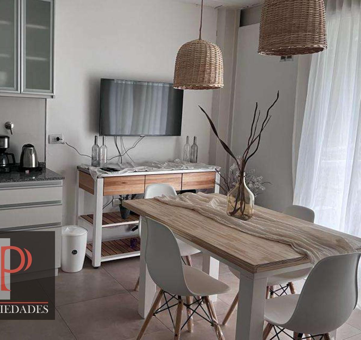 Departamento amoblado de 2 ambientes con cochera y terraza propia