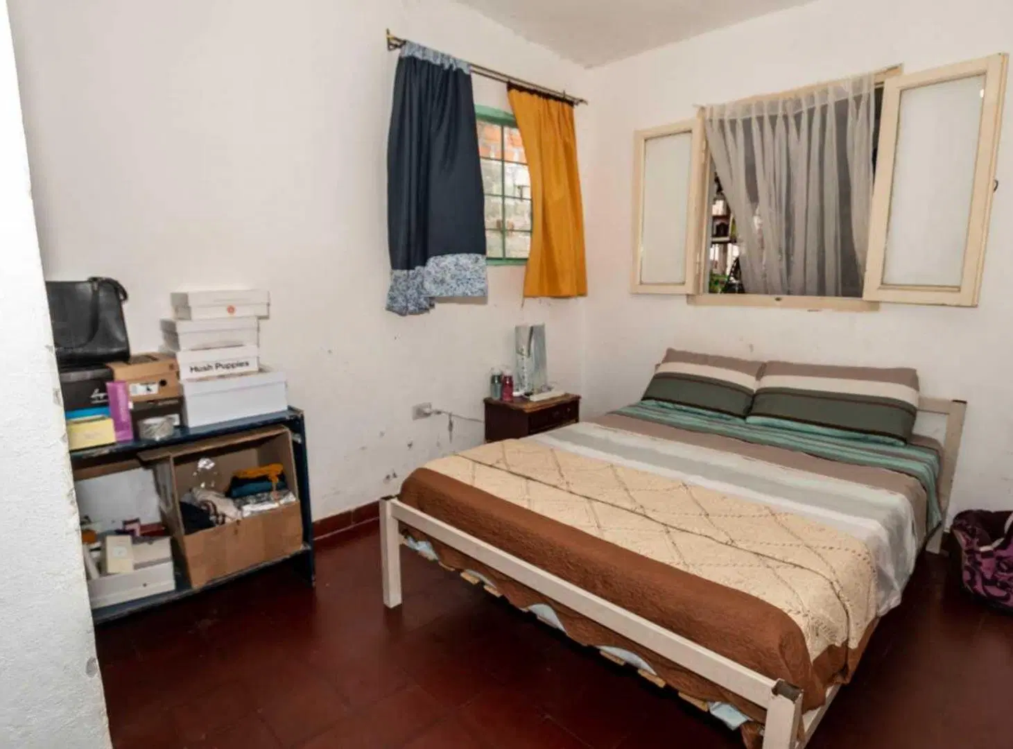CASA EN VENTA CON LOCALES SOBRE AV. ARTIGAS 2