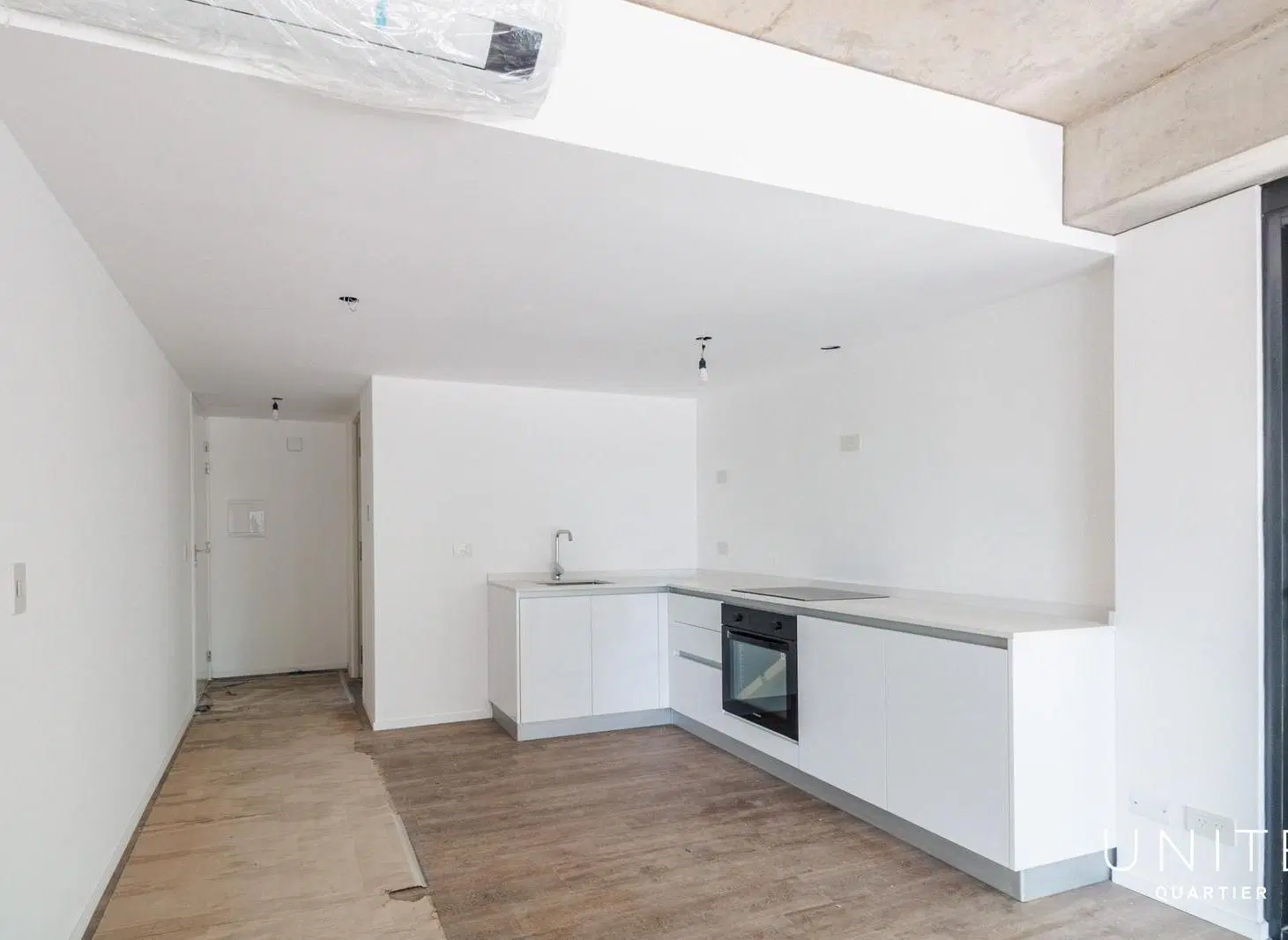 Loft divisible con gran balcón, cochera y amenities en piso 14 - Quartier del Bajo 4
