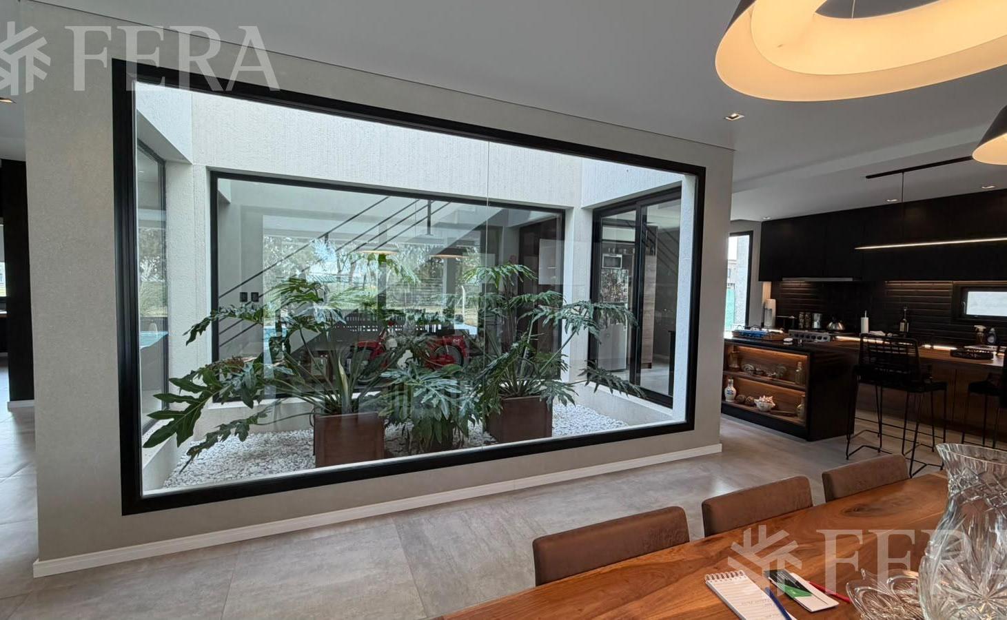 Foto de Venta de Casa 5 ambientes con piscina, quincho y parrilla en Puerto, imagen 5