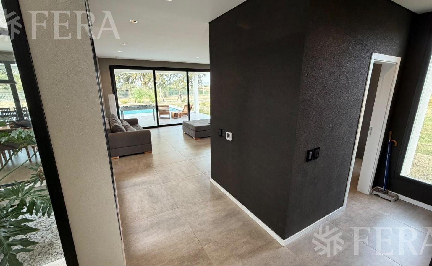 Foto de Venta de Casa 5 ambientes con piscina, quincho y parrilla en Puerto, imagen 1