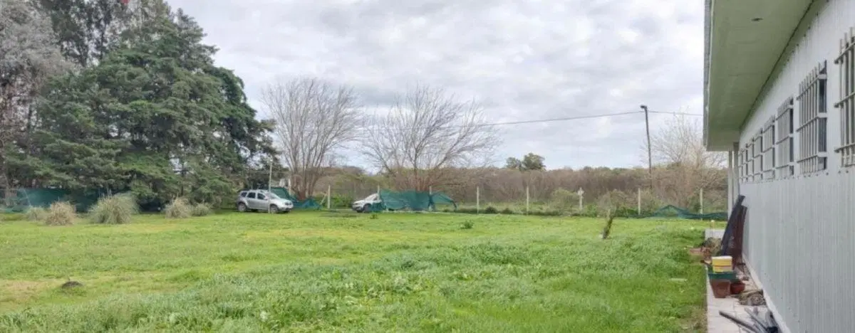 Excelente construcción en lote de 10.000 m2 4