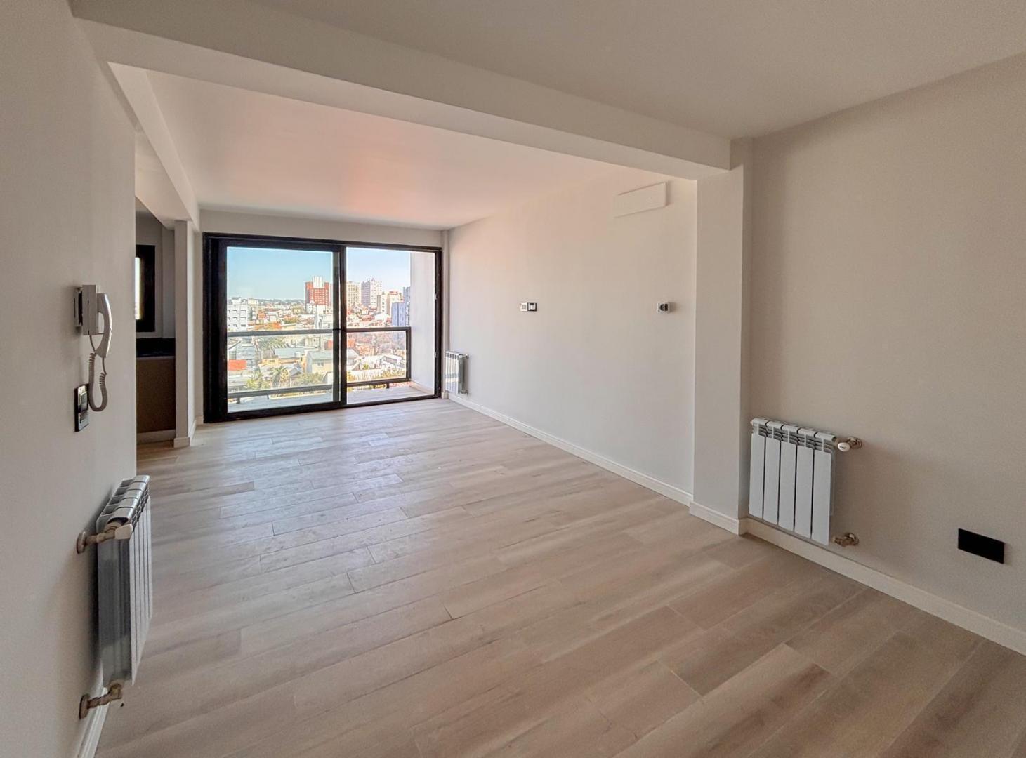 Foto de VENTA DEPARTAMENTO 2 AMBIENTES CON COCHERA Y BAULERA A ESTRENAR, imagen 1