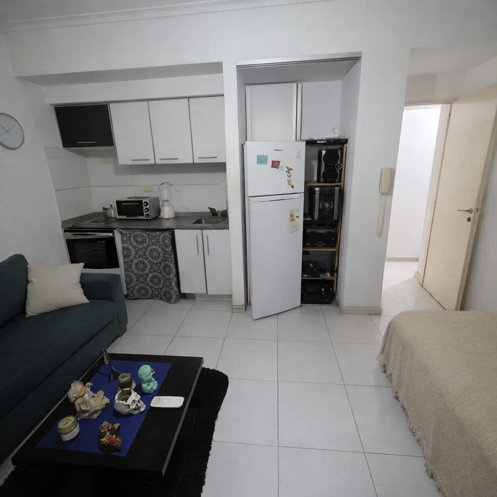 Monoambiente contrafrente con balcon con parrilla 4