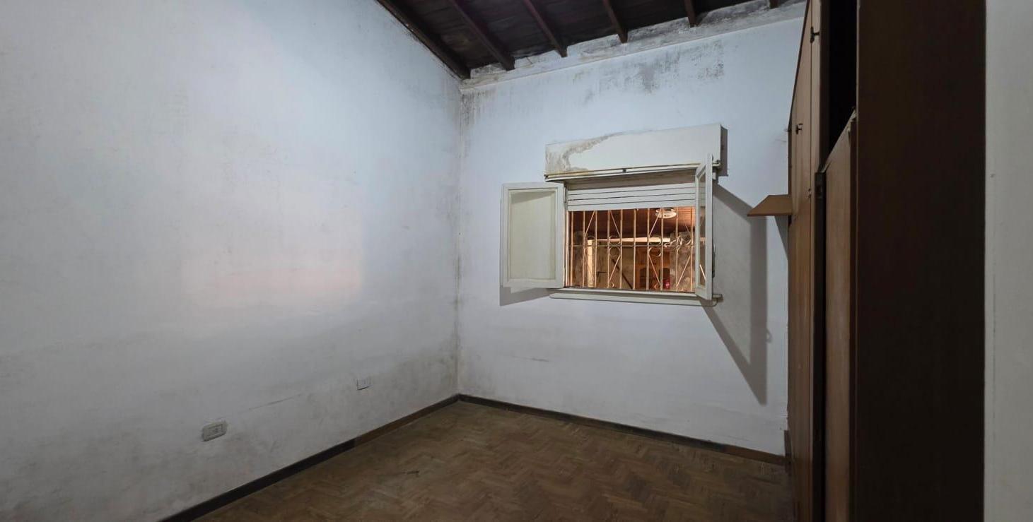 Casa sobre dos terrenos