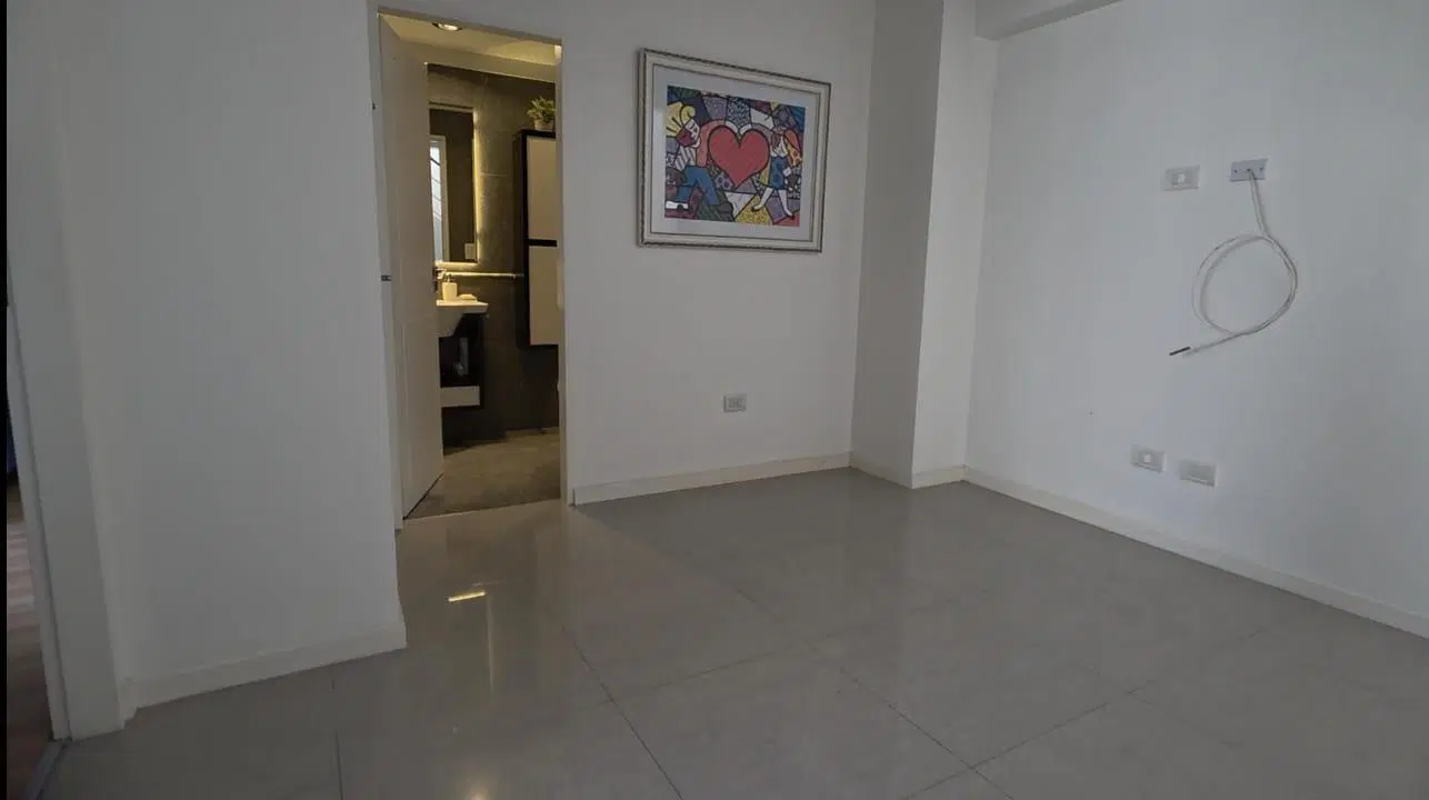 Triplex de 5 ambientes y dos cocheras en venta 4