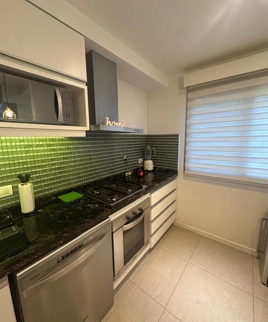 Triplex de 5 ambientes y dos cocheras en venta 3