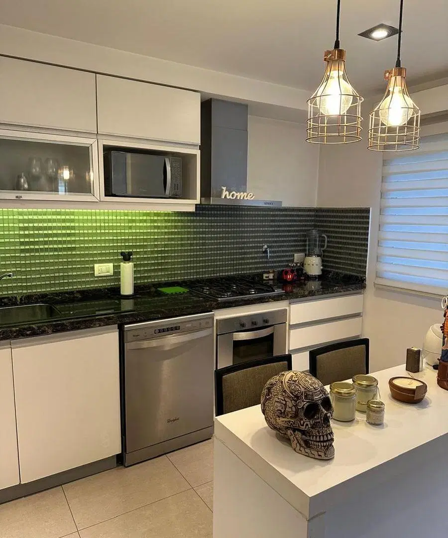 Triplex de 5 ambientes y dos cocheras en venta 2