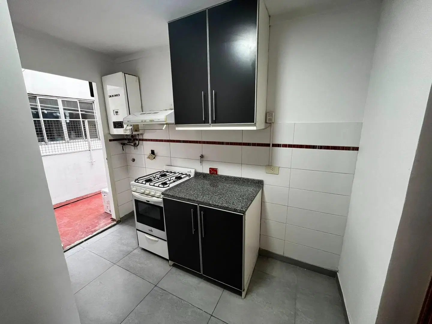 Departamento 3 ambientes con balcón y patio 2