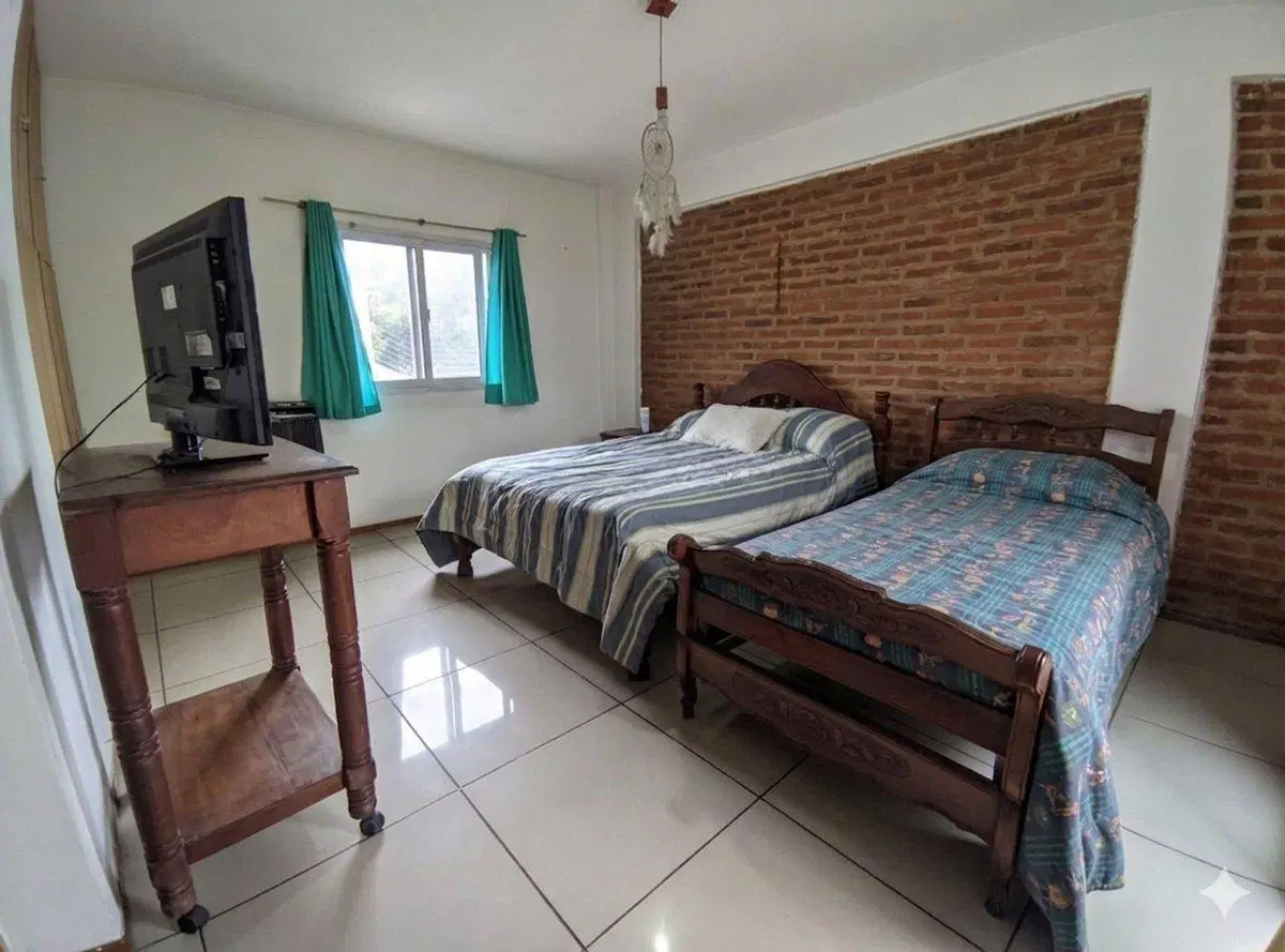 Vivienda multifamiliar + 3 locales 8