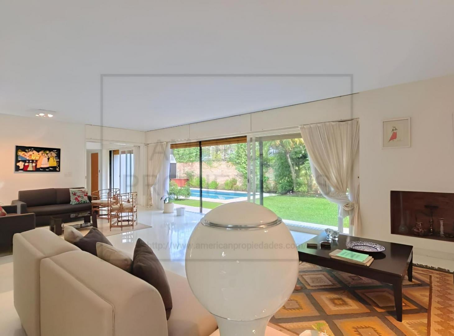 Foto de Venta Casa 500 mts2 Mario Roberto Álvarez triple frente Pileta Jardín, imagen 2