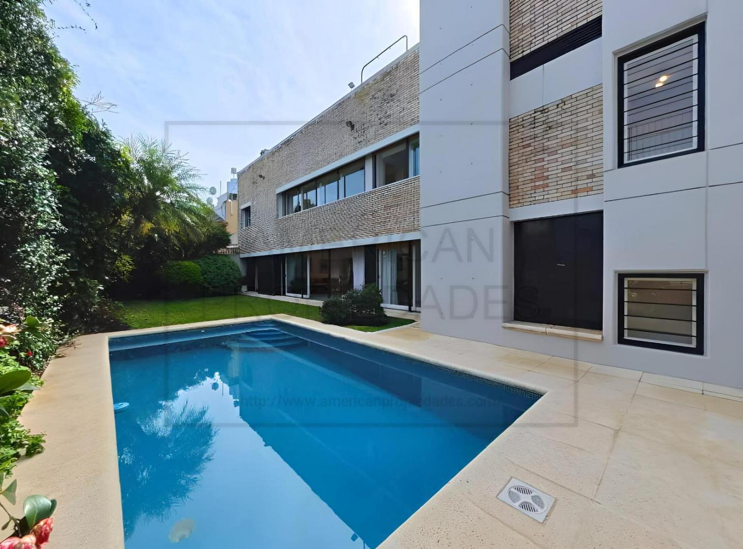 Foto de Venta Casa 500 mts2 Mario Roberto Álvarez triple frente Pileta Jardín, imagen 1
