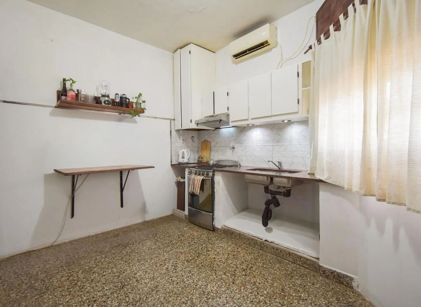 Venta casa 3 ambientes con cochera y terraza en Banfield Este 5