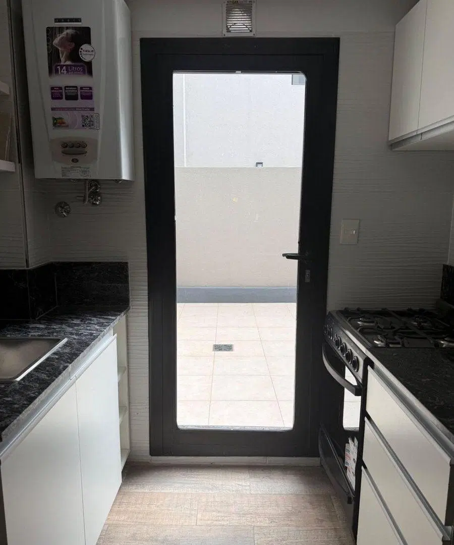 DEPARTAMENTO 3 AMBIENTES CON  PATIO Y BALCON 4