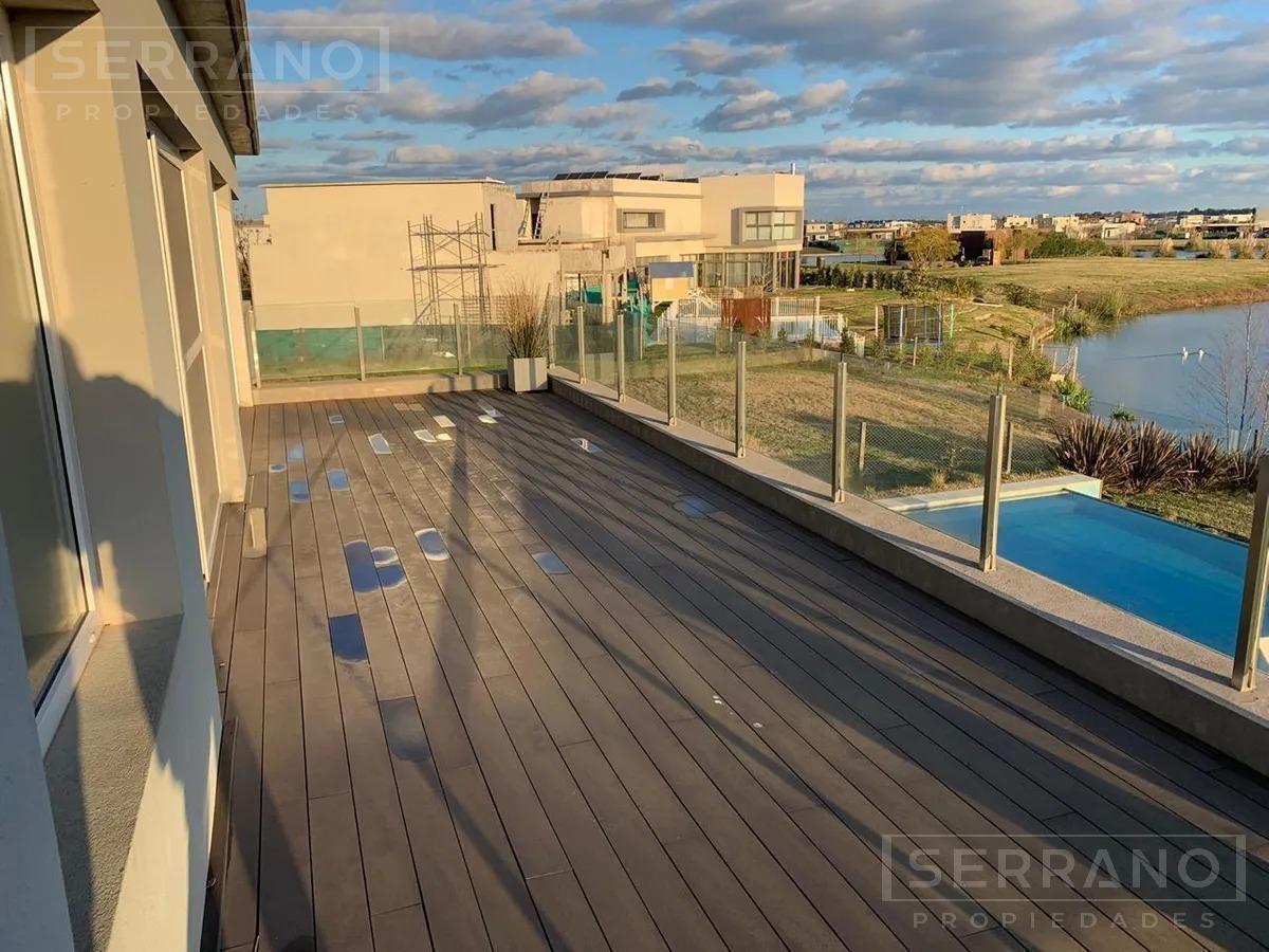 Foto de Venta casa a la laguna con tres dormitorios mas escritorio y playroom, imagen 5