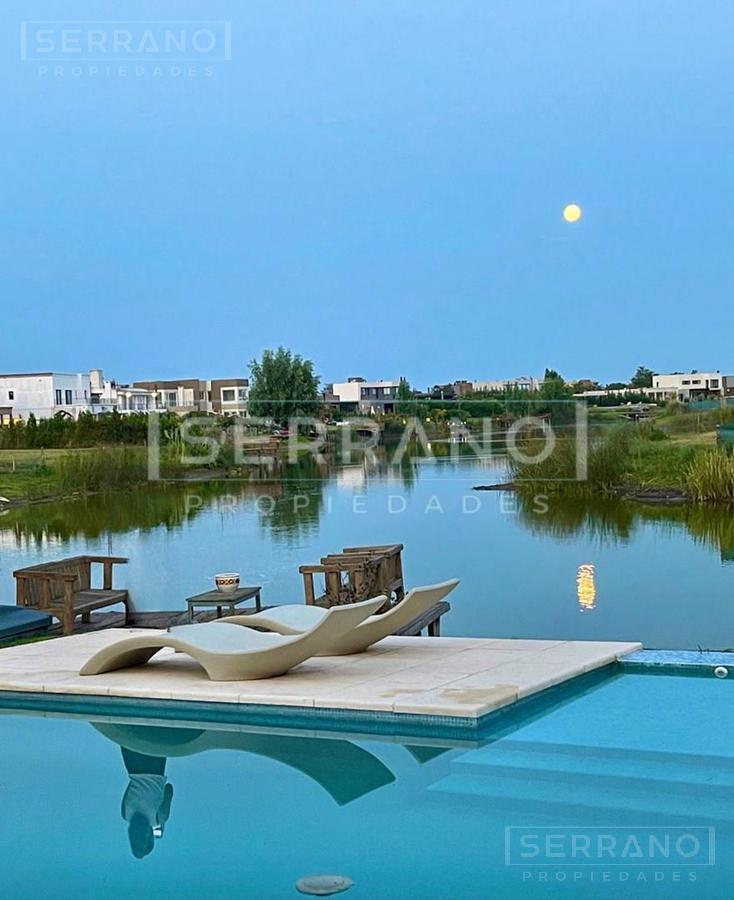 Foto de Venta Casa 4 ambientes con pileta a la laguna en el Canton Norte, imagen 2