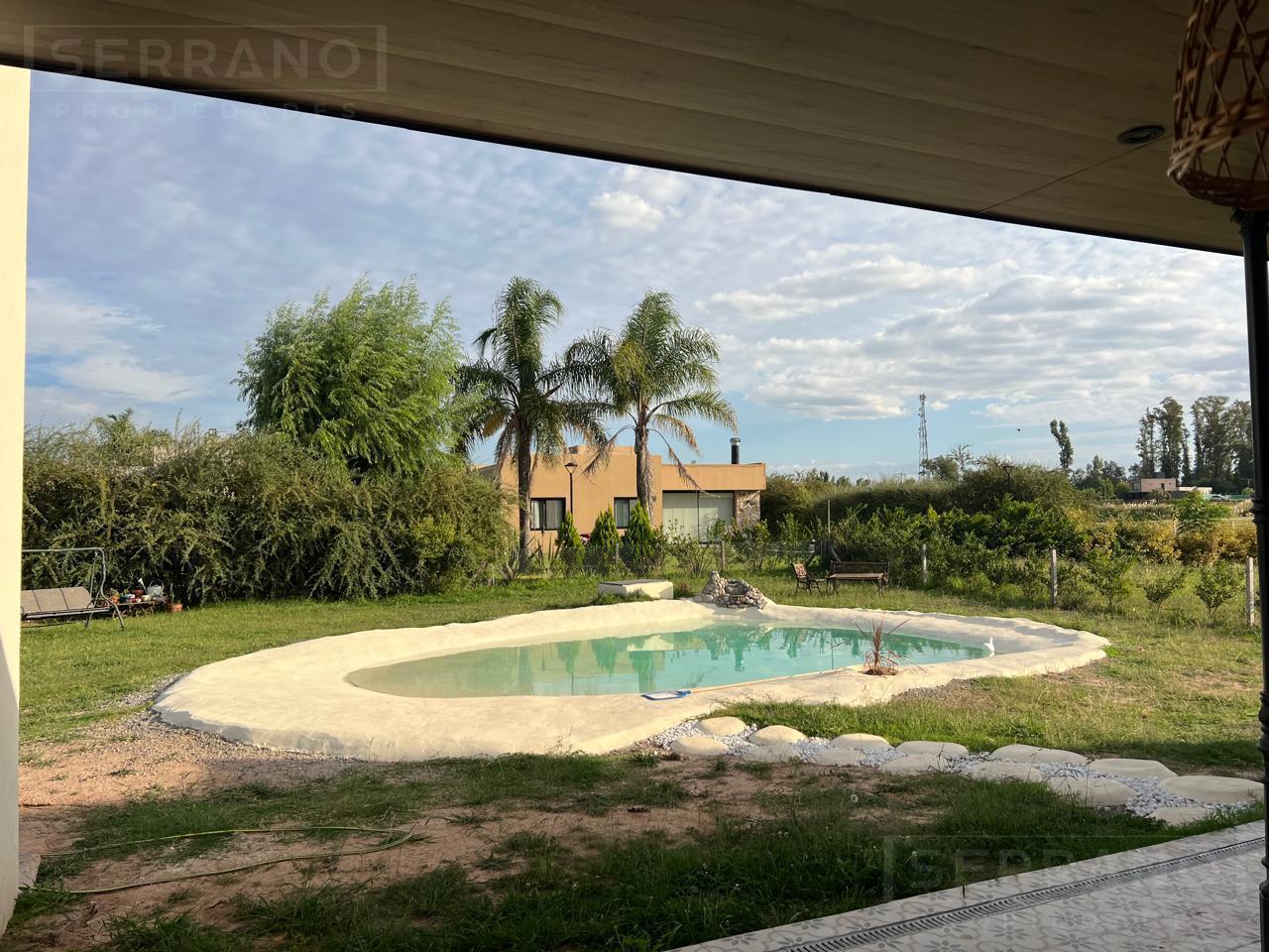Foto de Venta Casa 5 ambientes con Piscina en Barrio Cerrado Los Juncos - Luján, imagen 1
