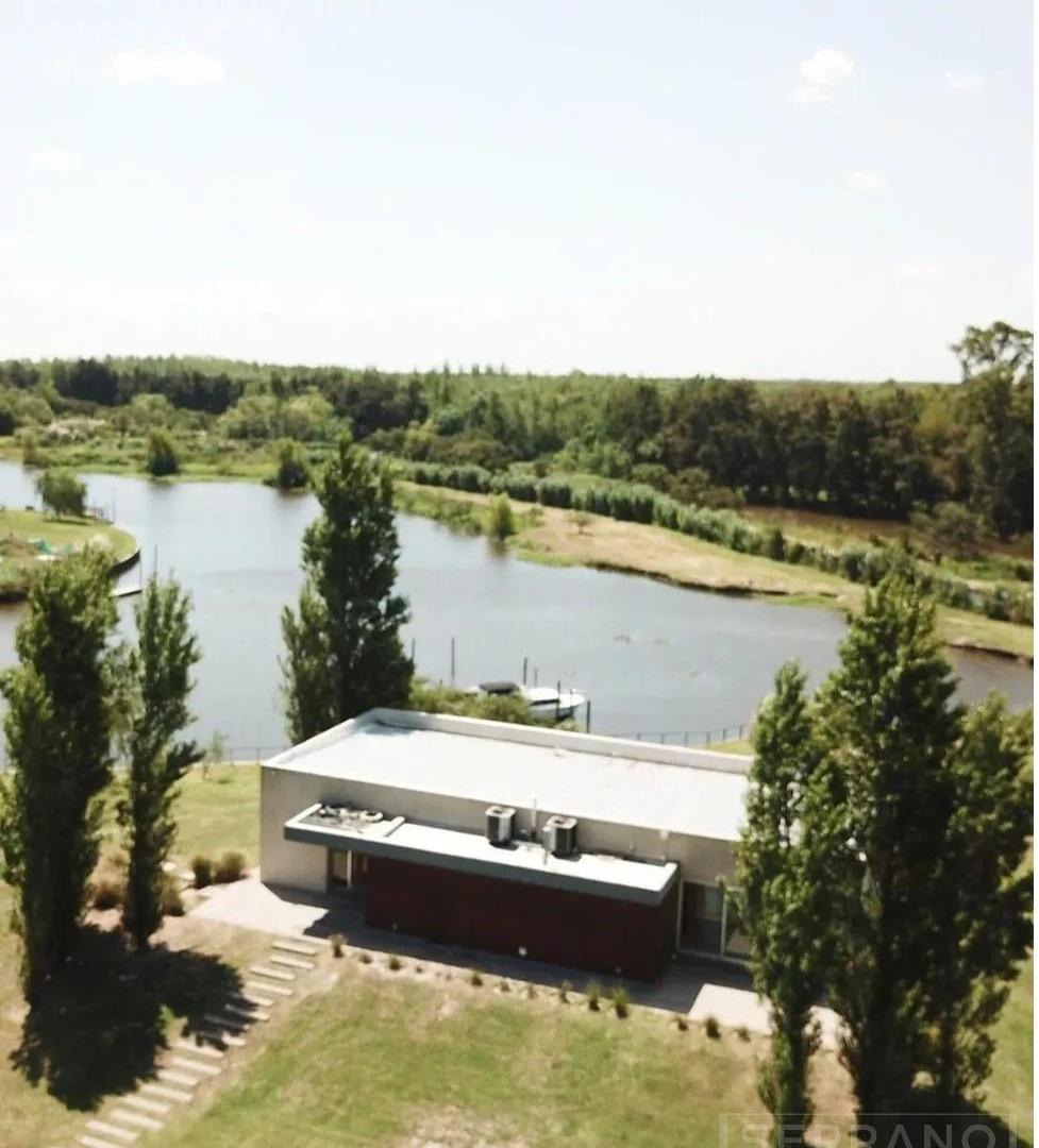 Foto de Venta Lote a la laguna en barrio Náutico El Cazal orientación Noroeste., imagen 4