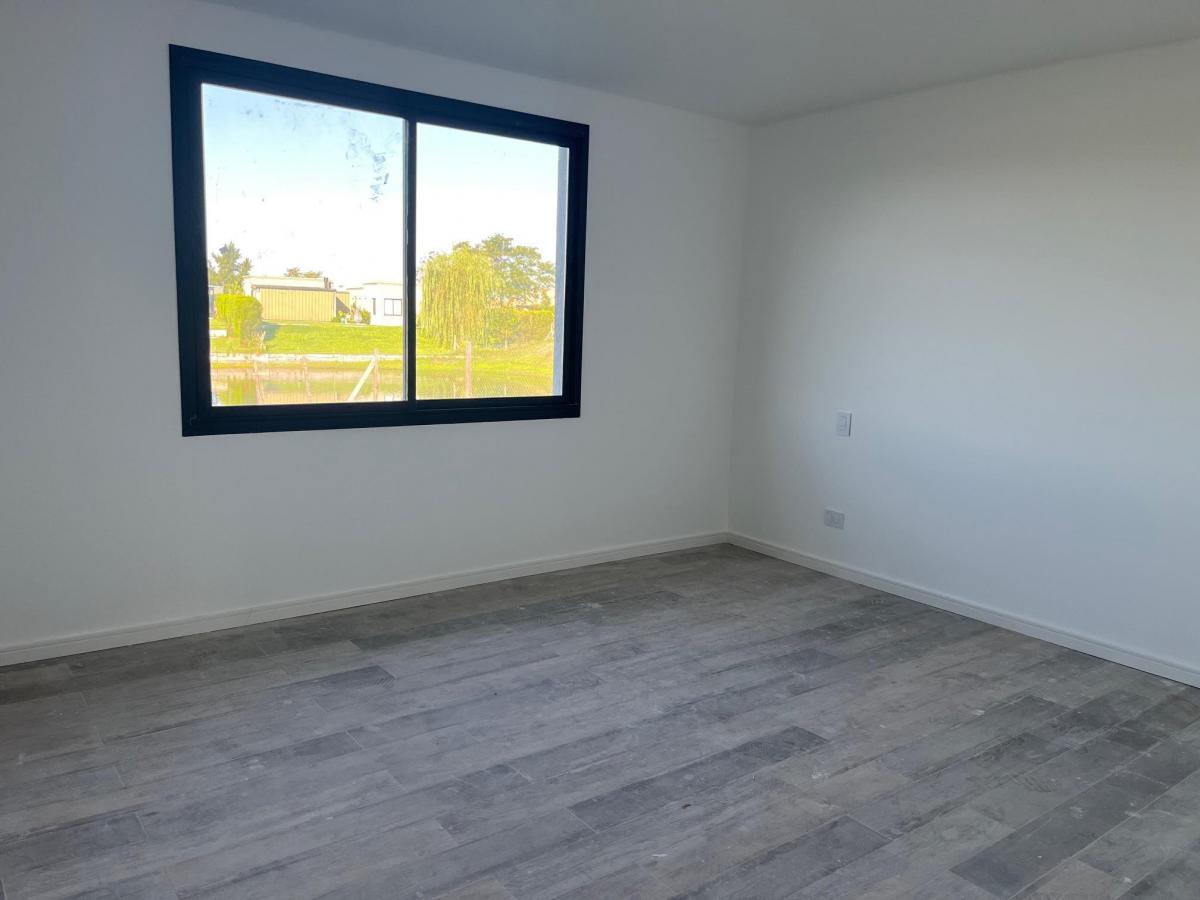 Foto de Lindísima casa a estrenar AL AGUA, en una planta y con pileta de, imagen 2