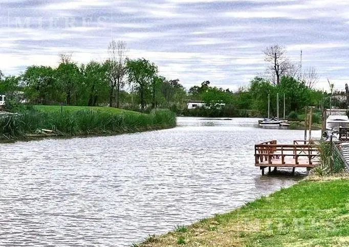 Lote en venta con salida al Rio en El Nautico Villanueva . 1