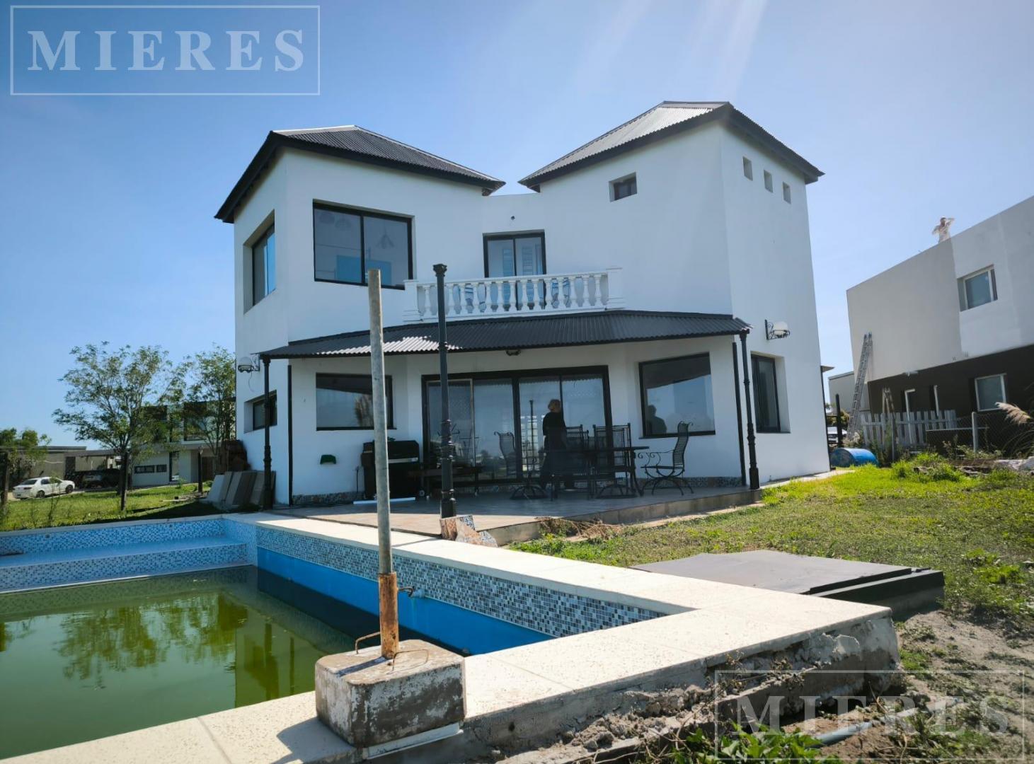 Foto de Casa en venta sobre lote a la laguna area 9 San Sebastian, imagen 1