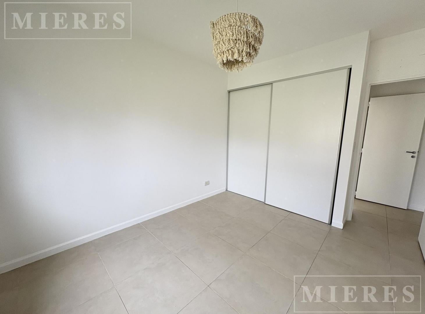 Foto de Casa en venta con renta sobre lote interno en Barrio Vistas Puertos, imagen 2