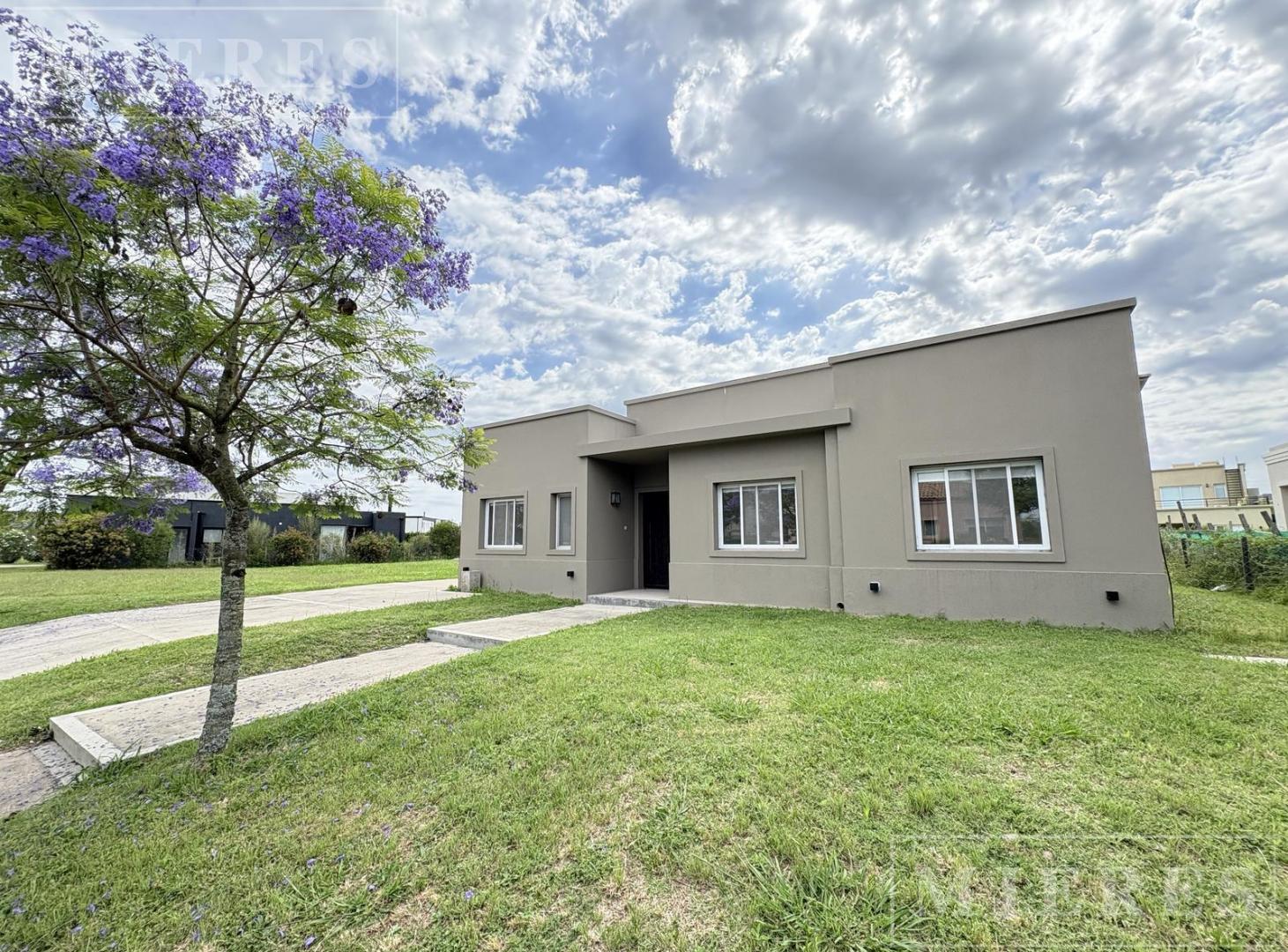 Foto de Casa en venta con renta sobre lote interno en Barrio Vistas Puertos, imagen 1