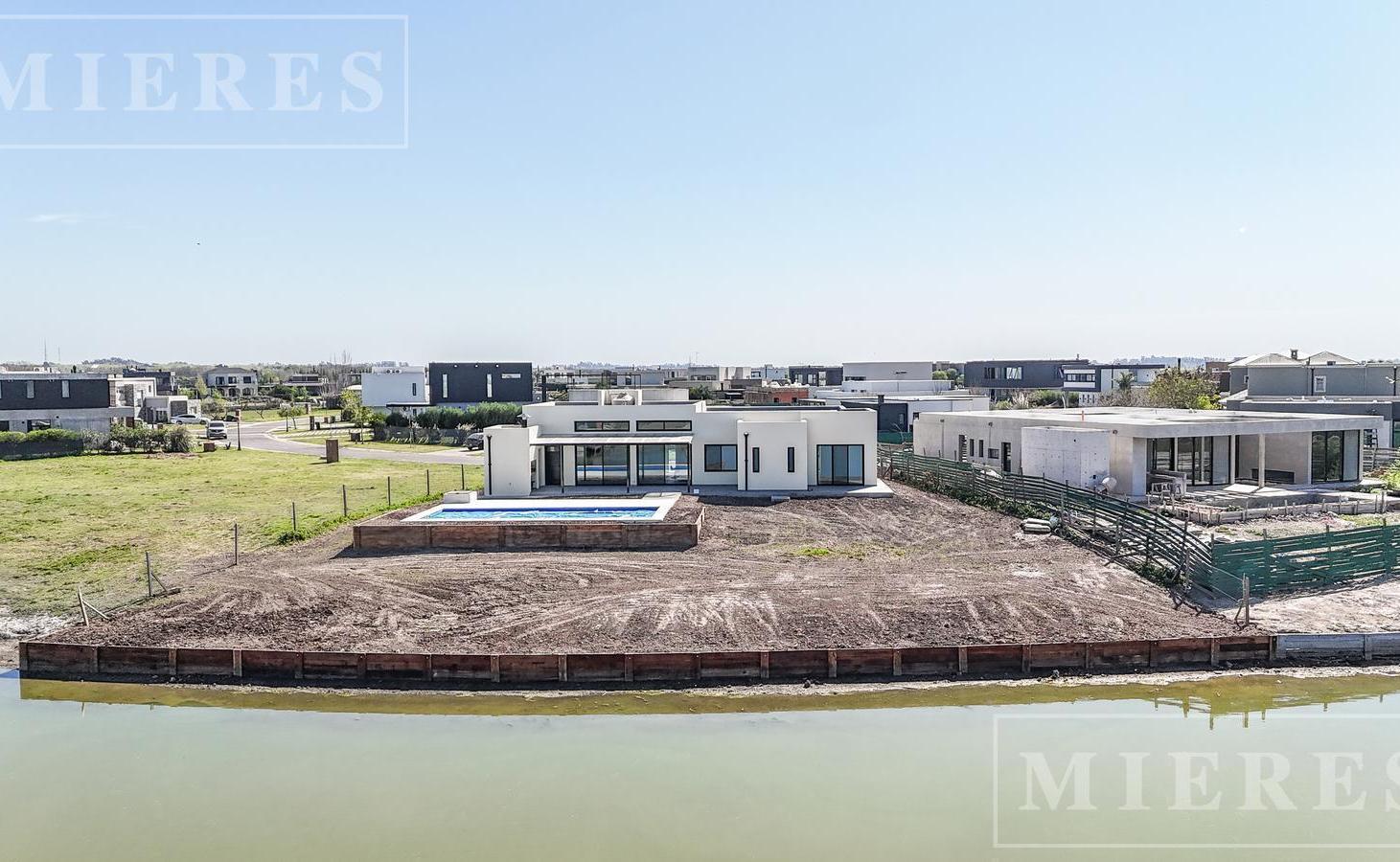 Foto de Casa en venta a Laguna en una planta area 8 Barrio San Sebastian, Loma, imagen 1