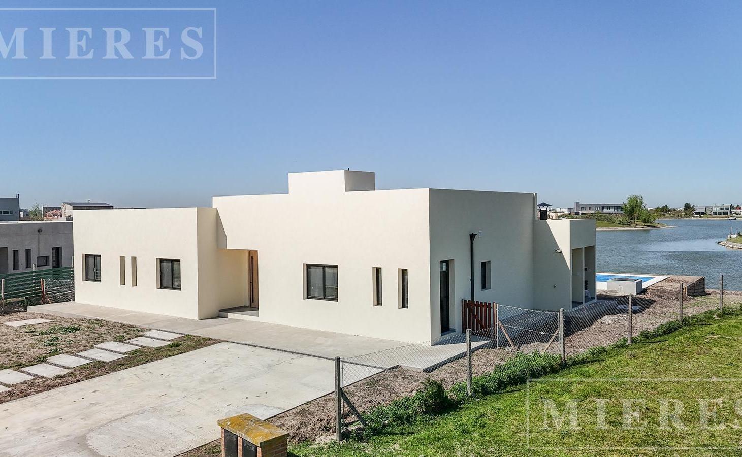 Foto de Casa en venta a Laguna en una planta area 8 Barrio San Sebastian, Loma, imagen 2