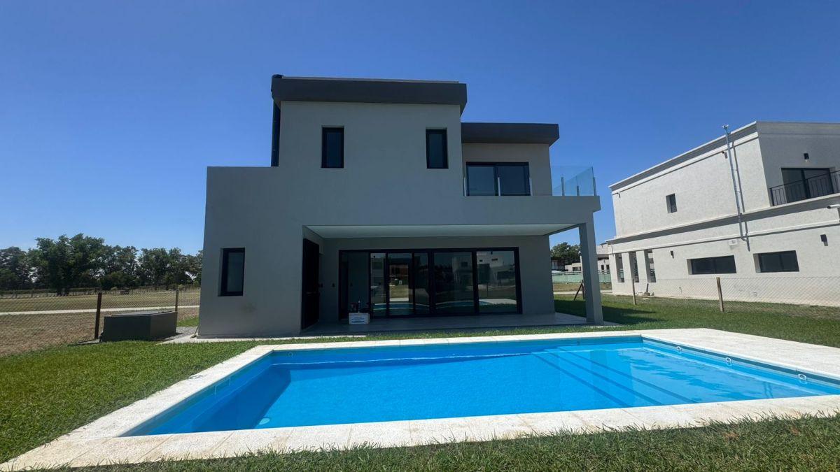 CASA EN VENTA A ESTRENAR CANNING CHICO 4 DORMITORIOS PISCINA