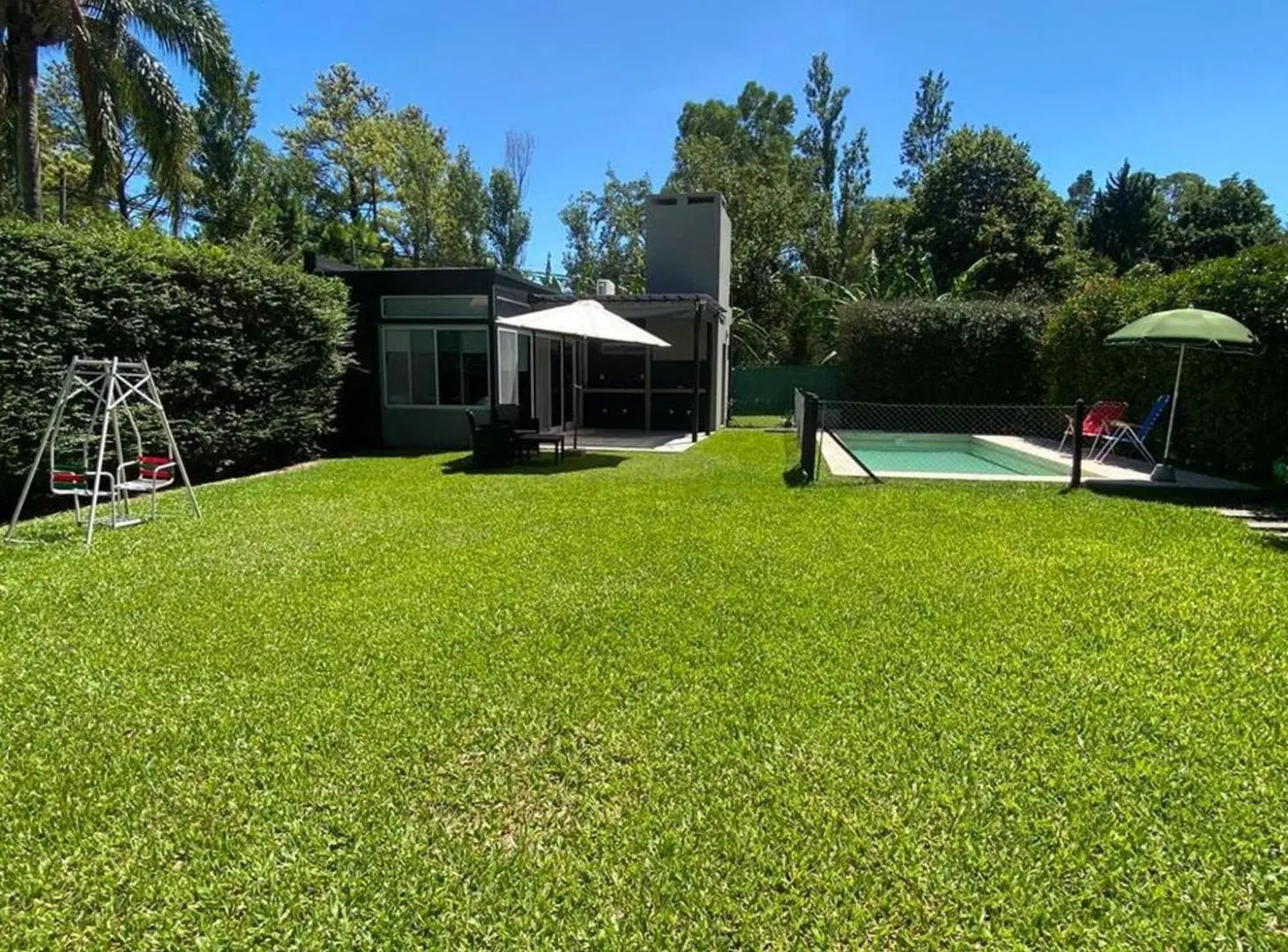 TERRENO EN VENTA EN FUNES CON QUINCHO Y PILETA 2