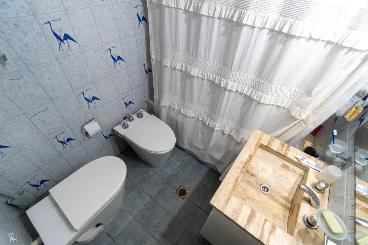 VENTA CASA-TRES DORMITORIOS CON JARDIN -TIRO SUIZO 3