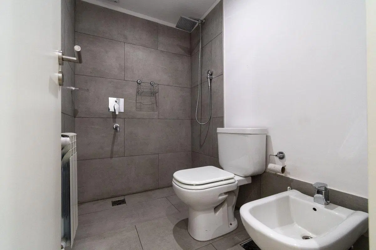 DEPARTAMENTO EN VENTA TRES DORMITORIOS CENTRO 5